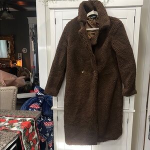 Teddy Coat the pockets are there but need to be opened up by cutting thread